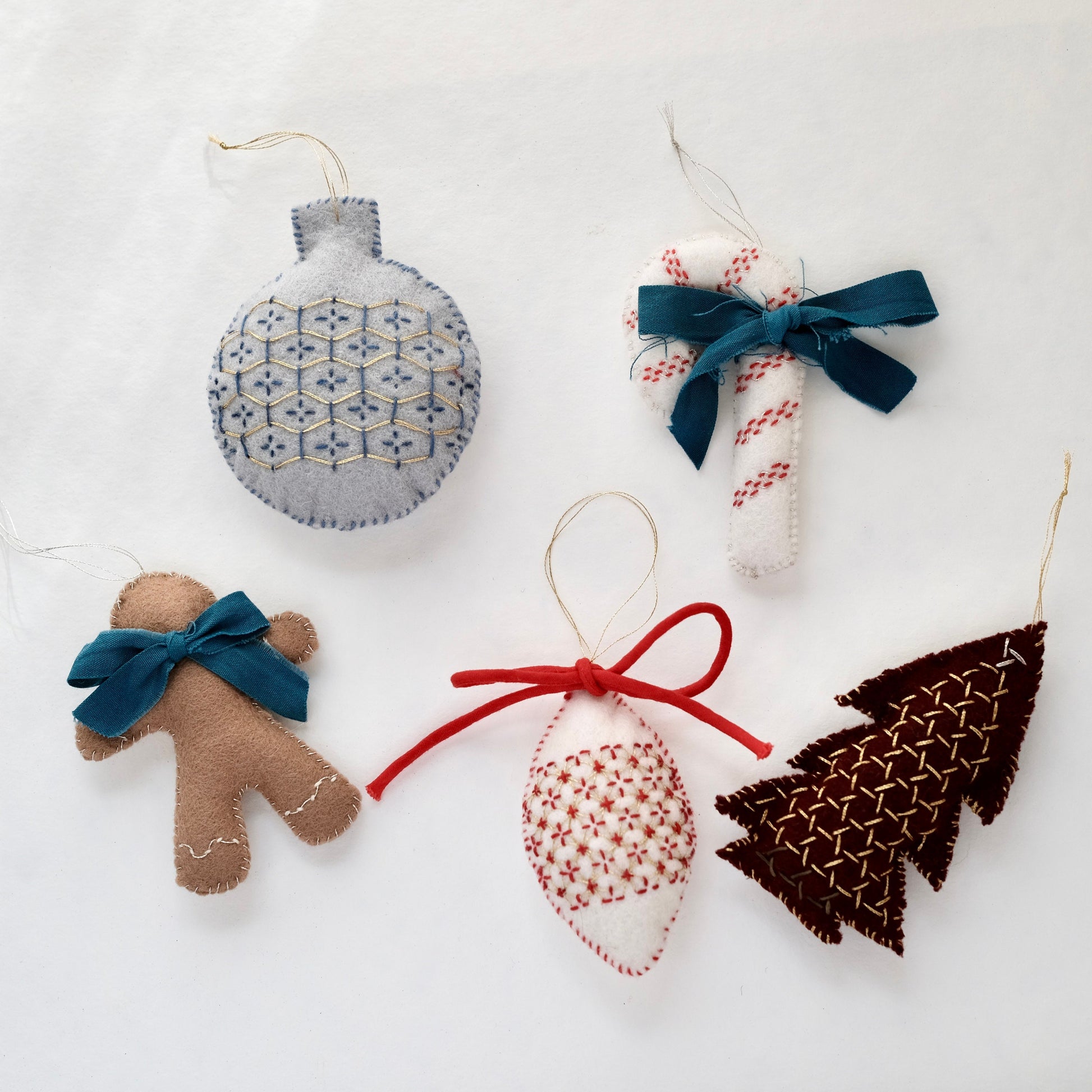 Full set of five finished Sashiko Christmas ornaments.